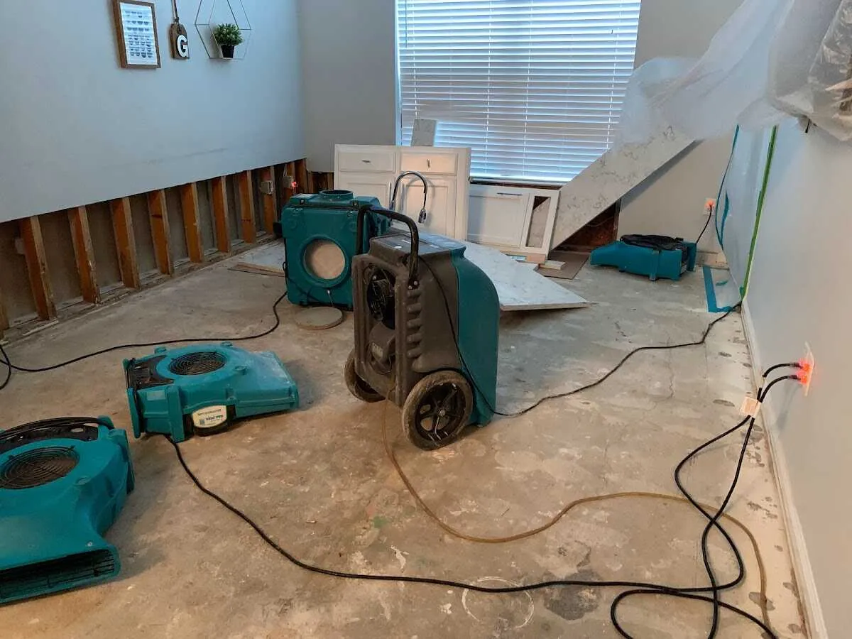 Dehumidifier in flood-cut room for Water Damage Restoration in Radford